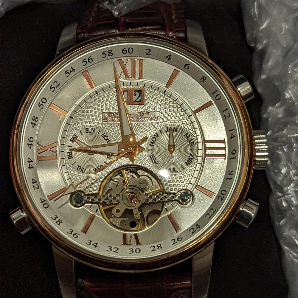 Pere De Temps rose gold watch